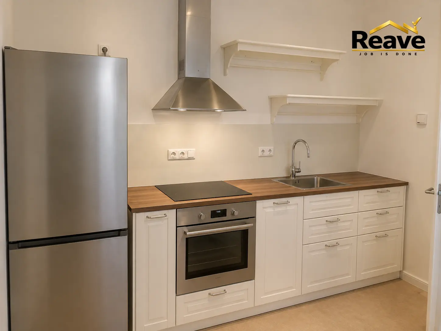 White shaker kitchen run with oak worktop and open wall shelves
